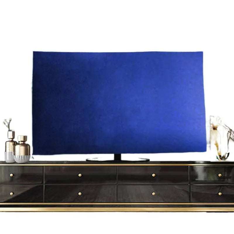 Pink velvet fabric cover draped over a large flat-screen television.
