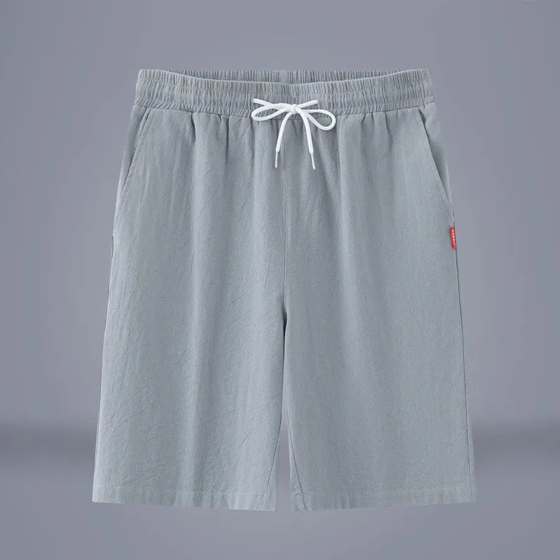 Cotton and linen cropped trousers in solid colours with a drawstring mid-waist