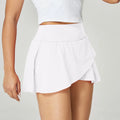 Women's solid colour quick-dry nylon sports shorts for running and fitness in multiple colours.