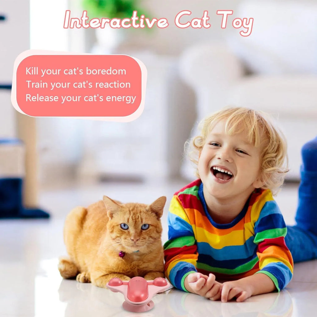 Blue interactive pet puzzle toy with treat cabin, bell, and catnip attachments on suction cup base