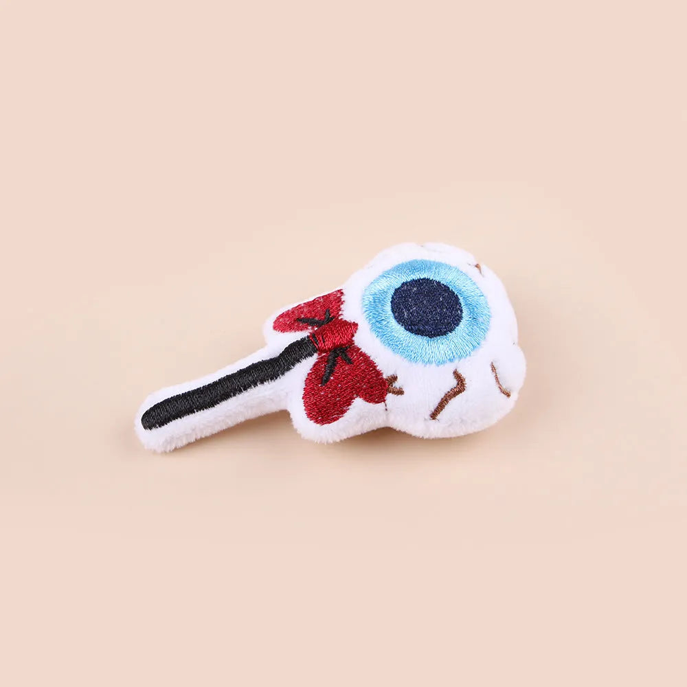 Handheld plush cat teaser toy with candy design on small wand for interactive play