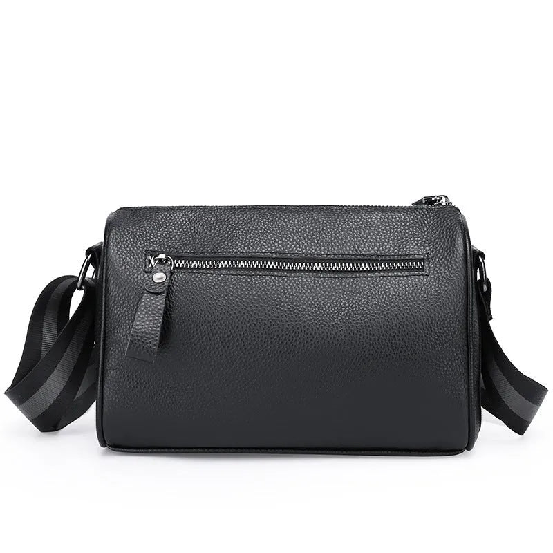 Black genuine leather one-shoulder crossbody bag showing front view and size.