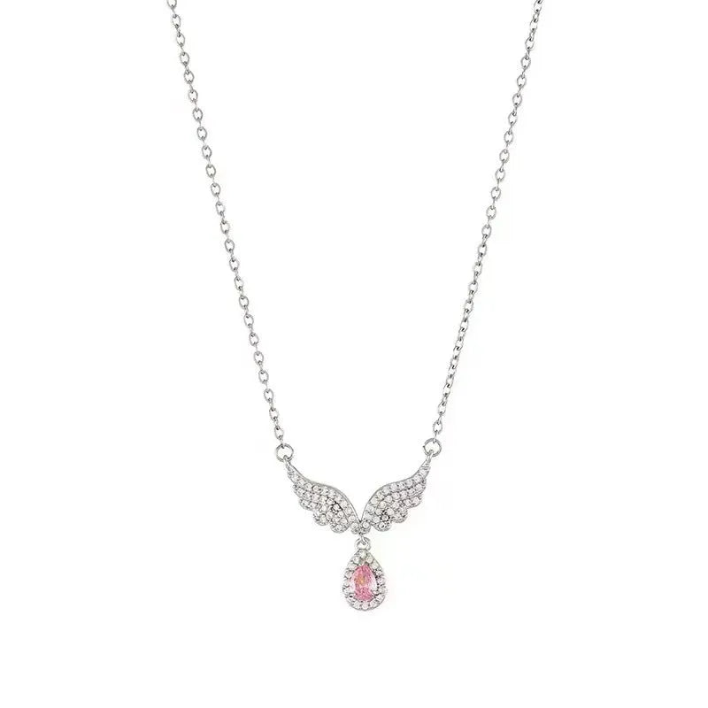 Close-up of a women's sterling silver fishtail pendant necklace on an adjustable O-ring chain.