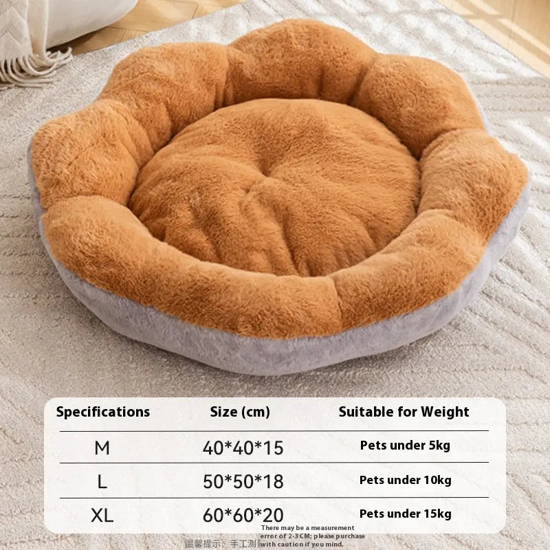 Round rabbit plush cat bed with a detachable cover in a grey and black colour.
