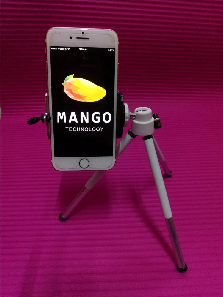 Black aluminium desktop phone holder with adjustable two-section bracket holding a mobile phone