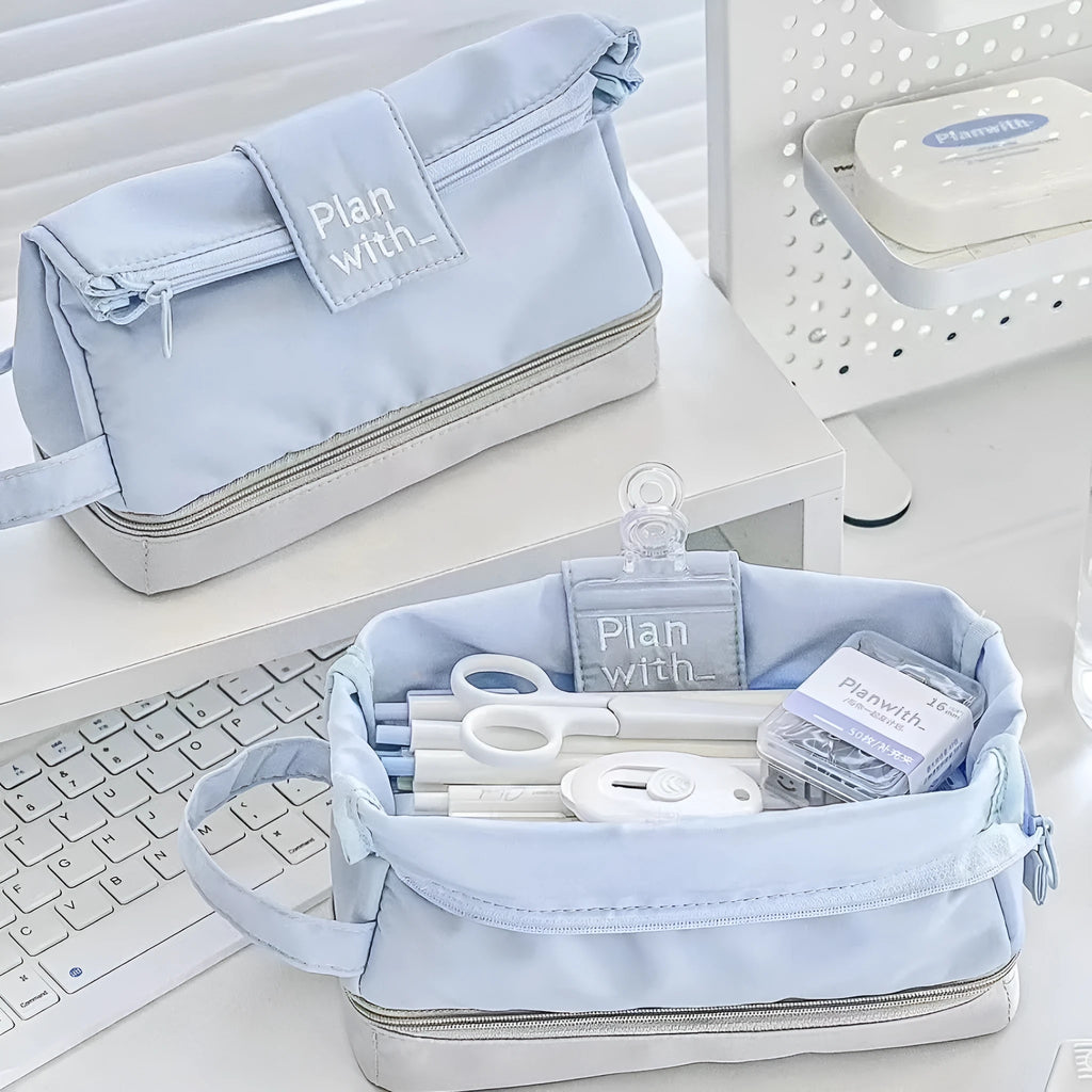 Folding double-layer polyester pencil case in dark blue, blue, and cream white colour options