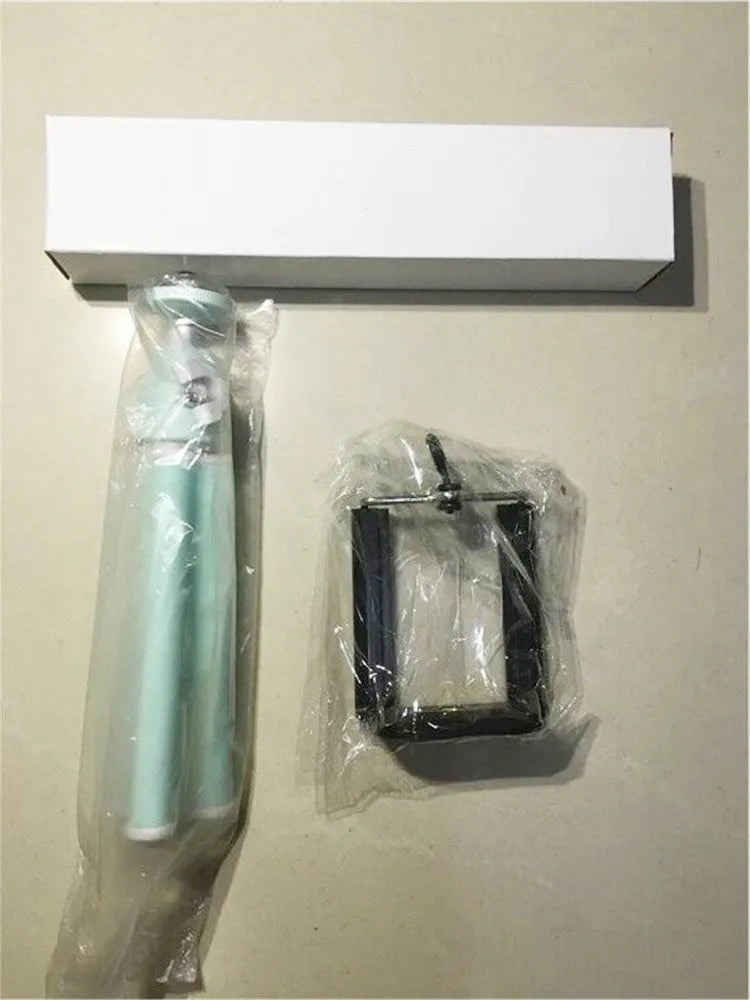 Black aluminium desktop phone holder with adjustable two-section bracket holding a mobile phone