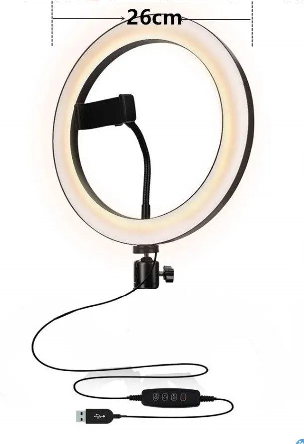 Silver aluminium alloy live phone stand extended to full height on a table.