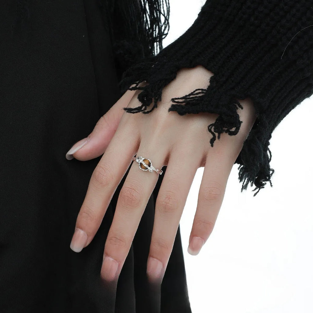 Adjustable opening Saturn ring in electroplated white gold colour with silver construction