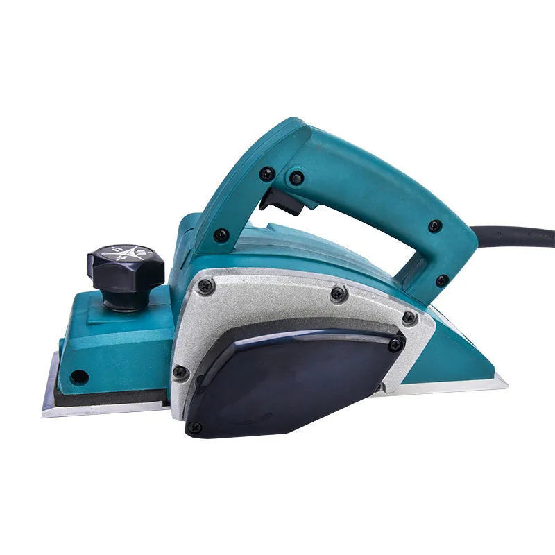 Red desktop electric wood planer with aluminium housing showing 82mm cutting width