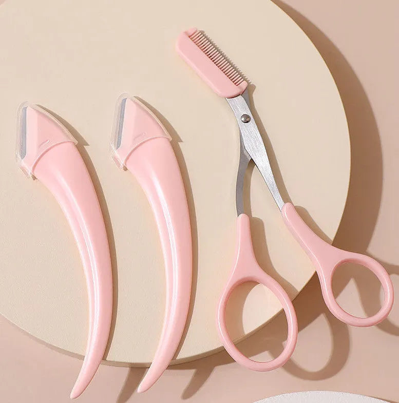 Curved moon-shaped eyebrow trimmer with a cutting comb on a white background.