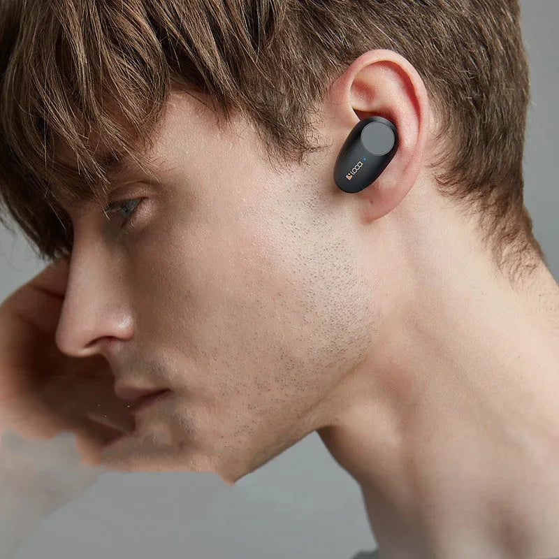 Black wireless Bluetooth headset with charging case showing ANC noise reduction and 10-metre range