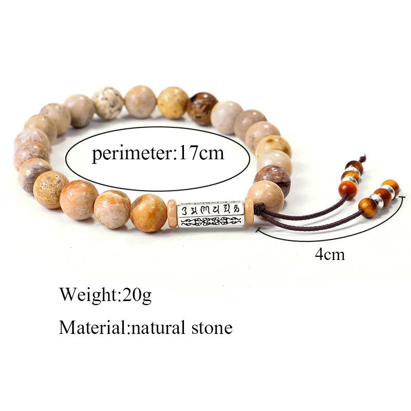 Handmade wood colour stone bead bracelet with retro design on a wrist