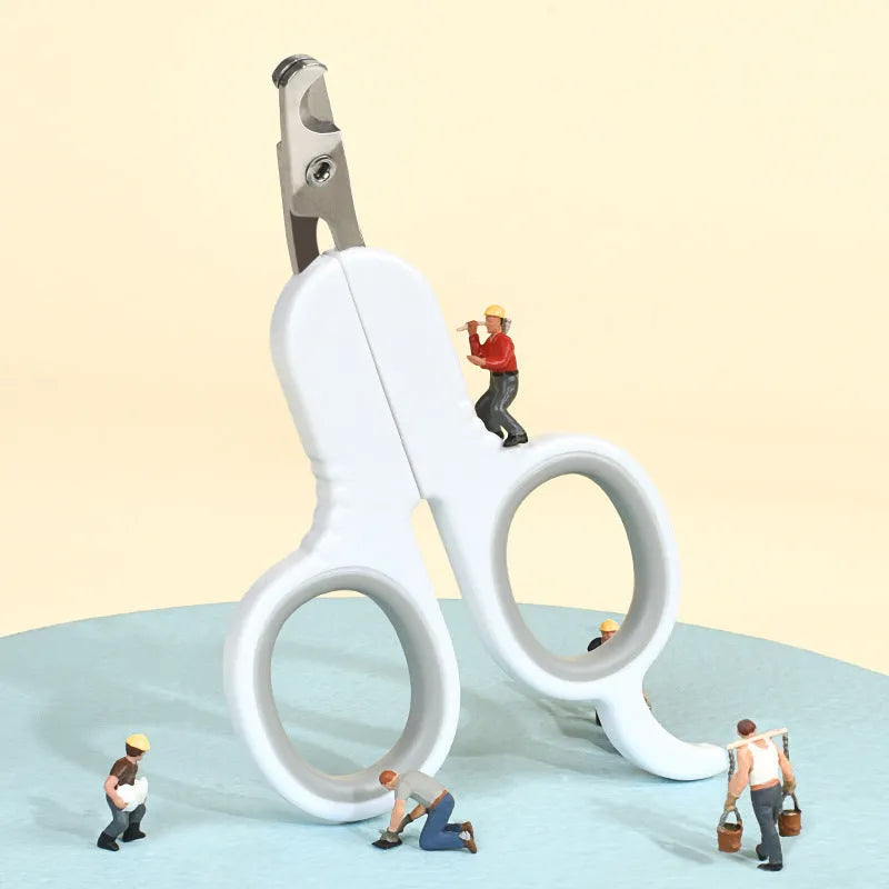 Professional grey pet nail clippers with curved tips and a rubberised ergonomic handle.