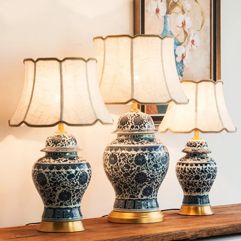 Chinese blue and white porcelain table lamp with copper base and cloth shade