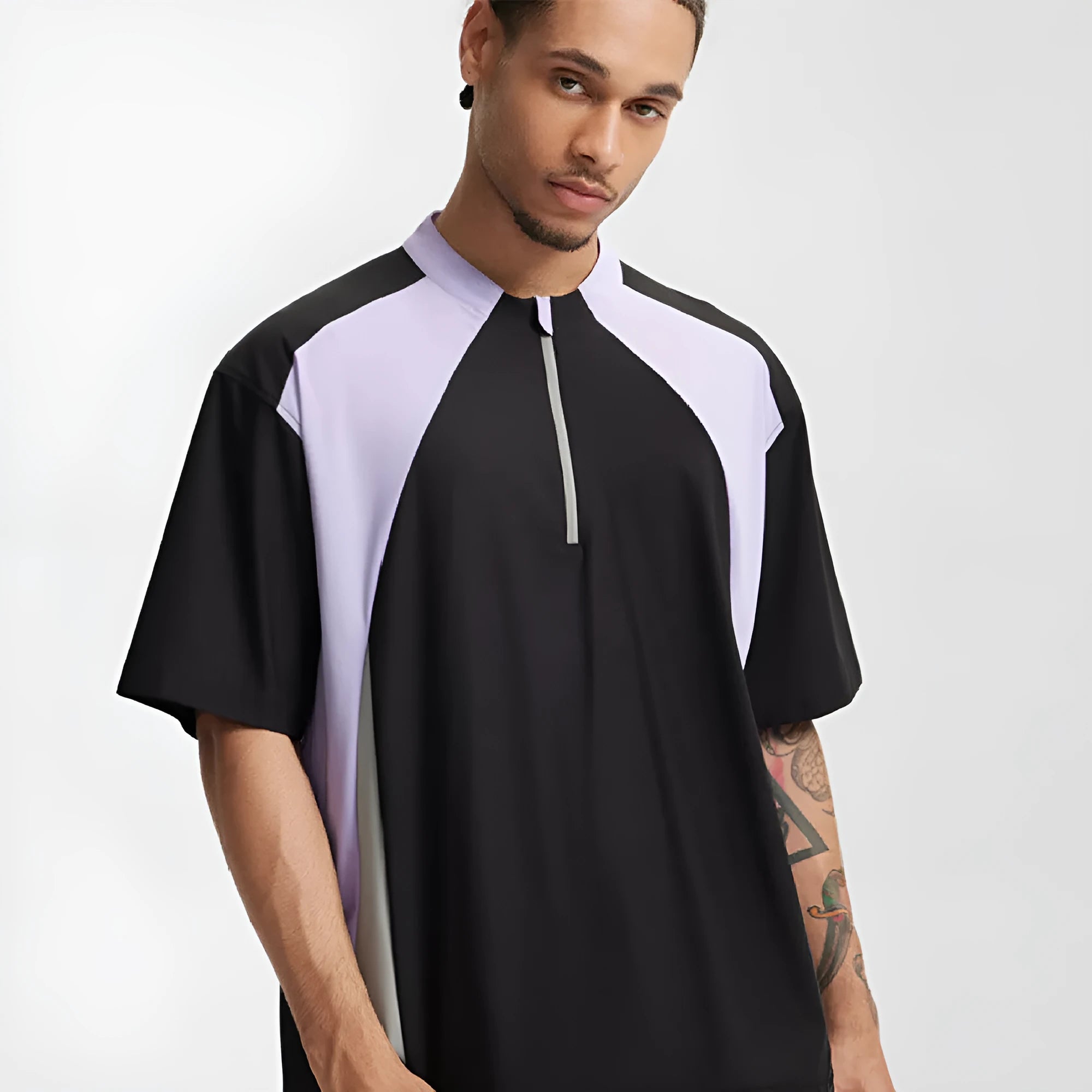 Men's solid colour polyester top showing stitching details and available in long or short sleeve black and beige options