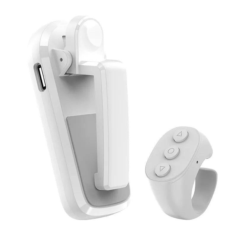 A black wireless remote and a foot pedal page turner clicker for tablets and e-readers