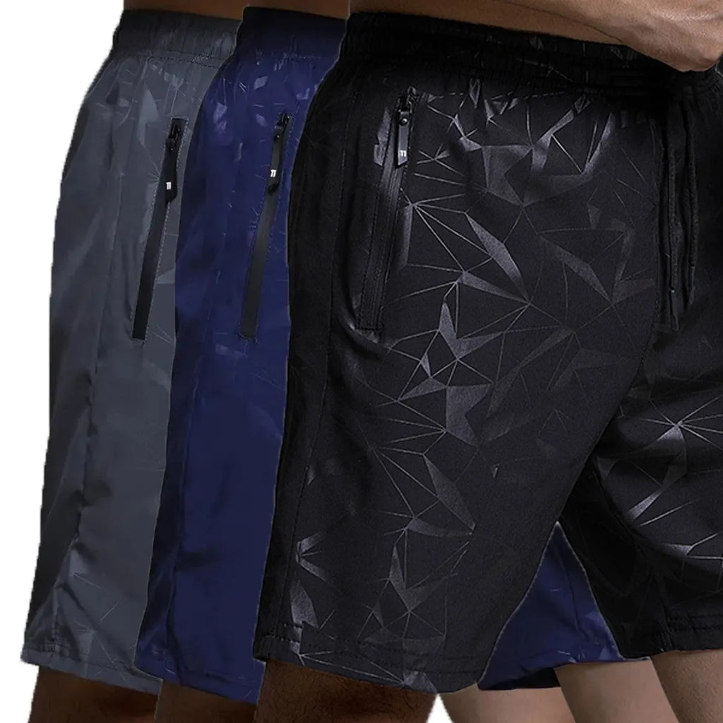 Man wearing loose grey printed sports shorts on a beach