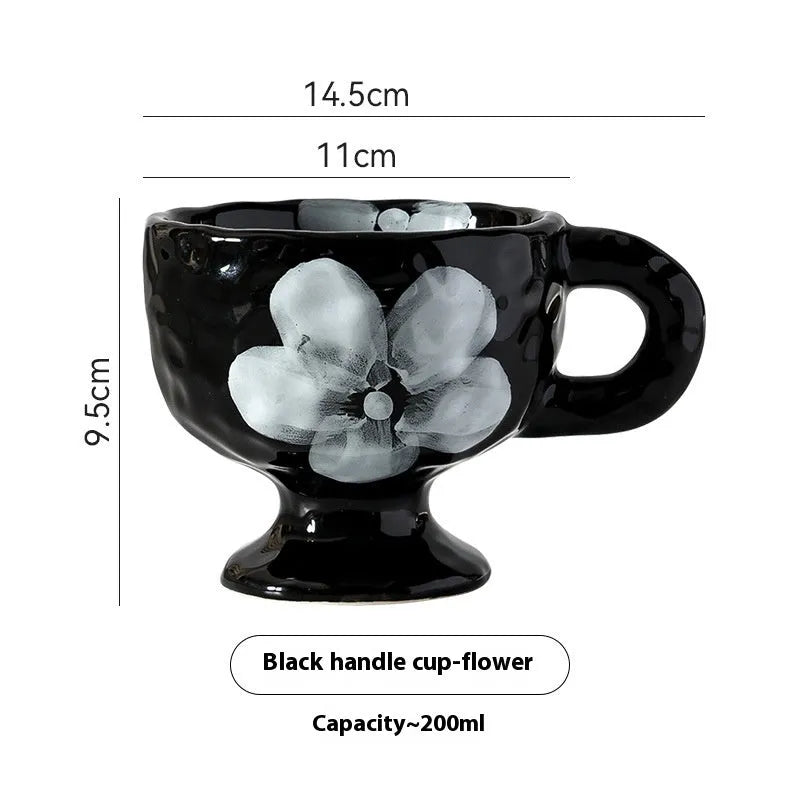 Hand-pinched irregular ceramic mug in solid colour with modern simple style, shown from side angle