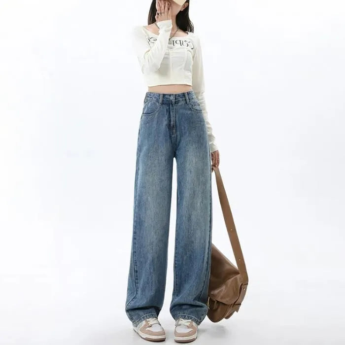 Women's retro blue high-waist wide-leg jeans laid flat, showing straight leg cut and denim texture.