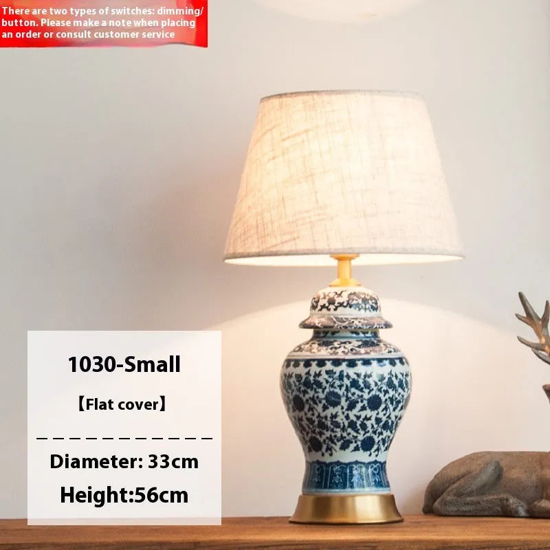 Chinese blue and white porcelain table lamp with copper base and cloth shade