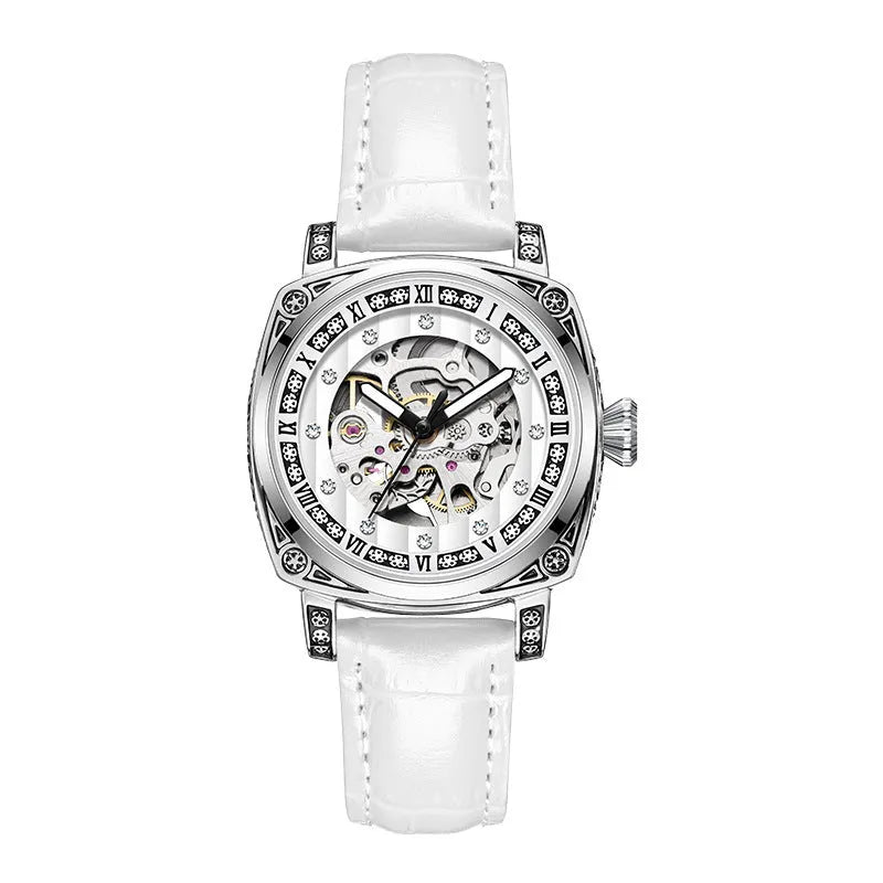 Leather strap mechanical watch with luminous hands on a wrist, showing black dial variant.