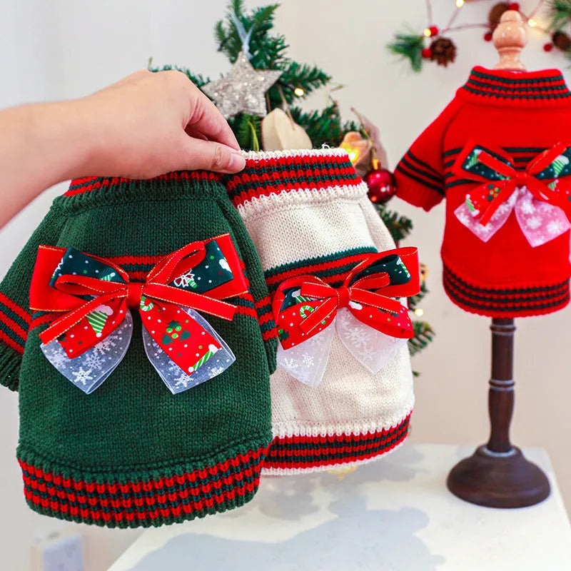 Red and green Merry Christmas dog jumpers for small to large pets on a festive background