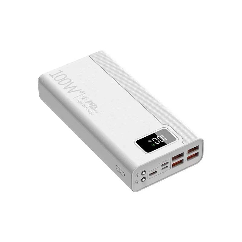 Large capacity black and white plastic power bank showing size relative to a smartphone.