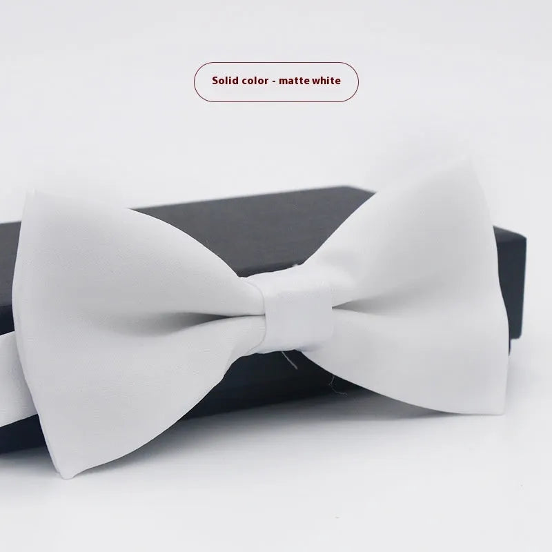 Men's solid colour formal bow tie in flat head style showing 12x6cm dimensions