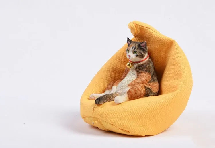 Lazy cat resin car dashboard ornament with sofa, 7.5cm tall