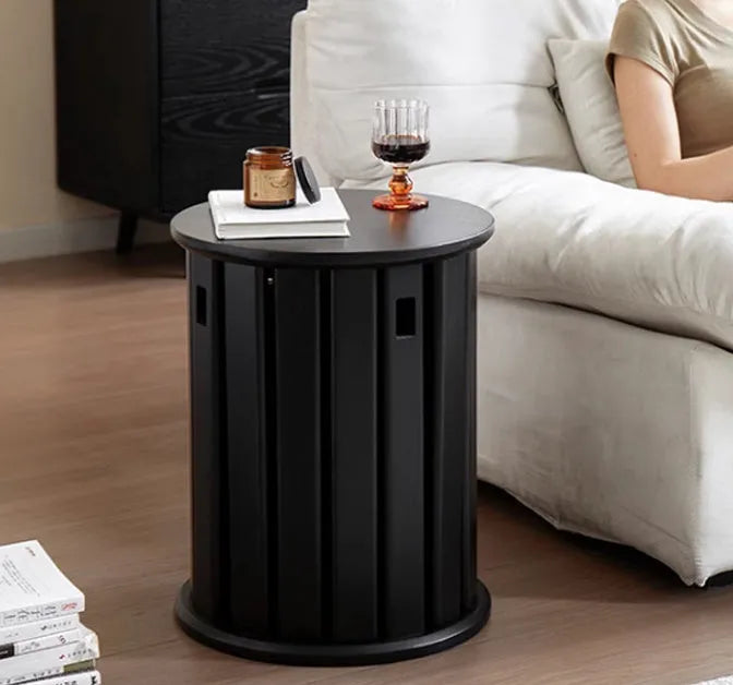 A stackable round metal dining stool in a modern style, shown in a choice of four colours.