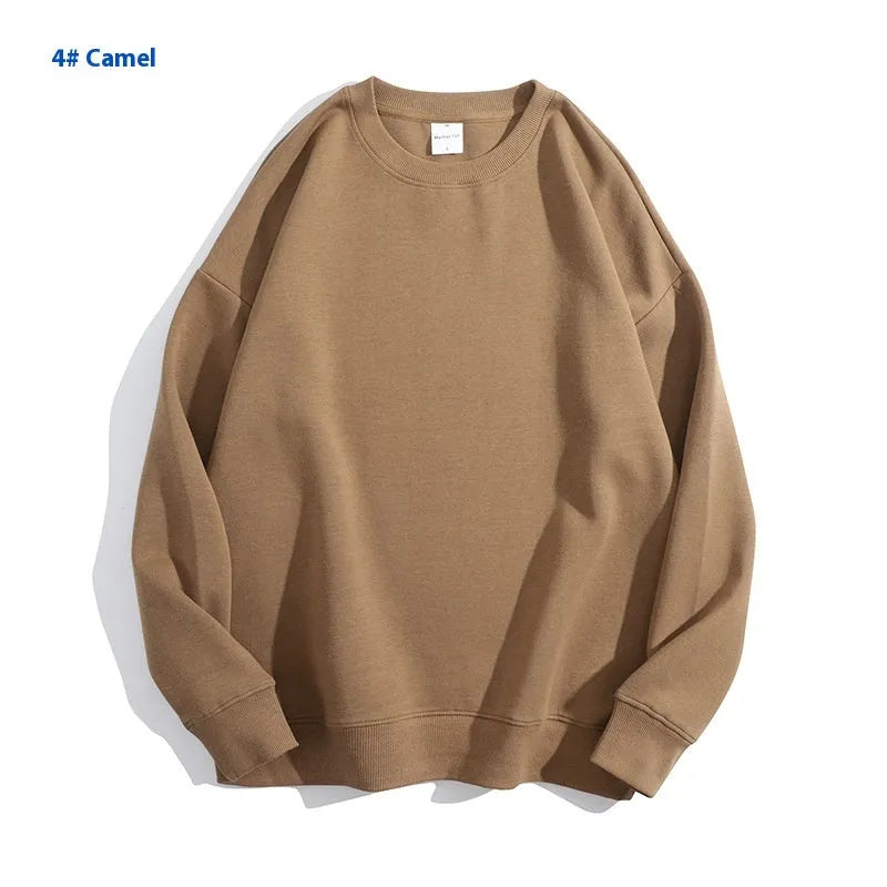 Women's loose fit cotton off shoulder sweater in a solid colour with round neck and long sleeves.