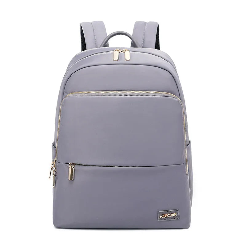 Oxford cloth women's backpack in black and purplish grey, showing large capacity and shoulder straps.