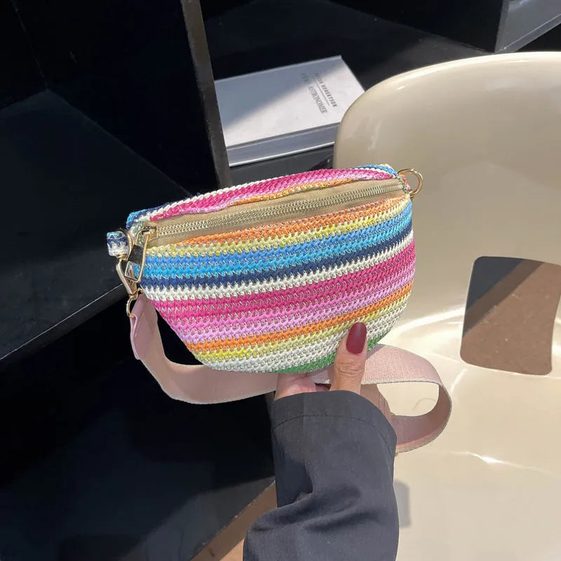 Bohemian style straw woven women's shoulder bag with adjustable strap in pink colour