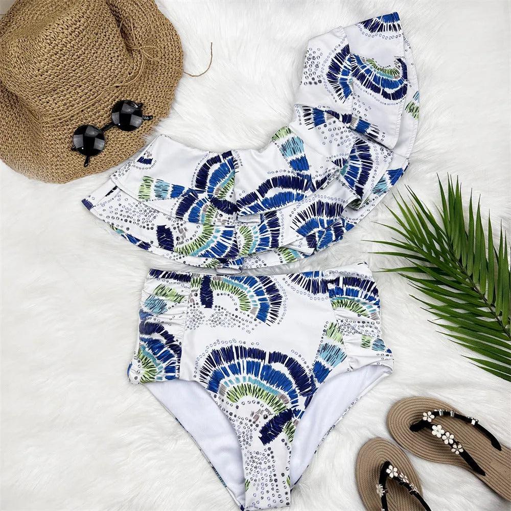 White women's one-shoulder bikini with lotus leaf detail and double-layer construction.