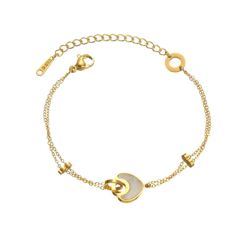 Women's stainless steel bracelet with a double-layered resin heart shape and electroplated finish.