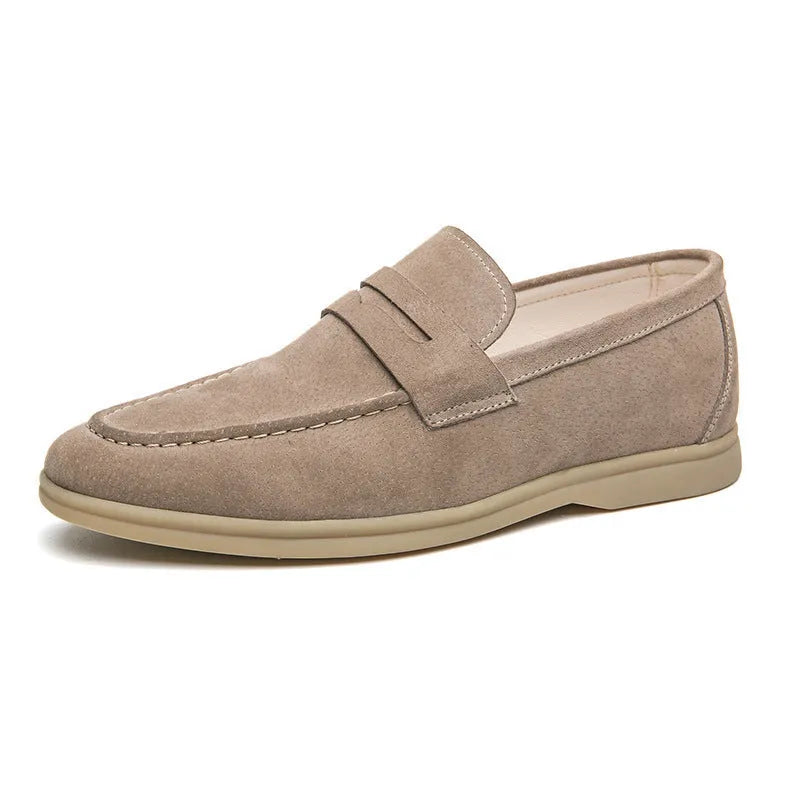 Men's beige leather slip-on casual shoes with a round toe and rubber sole.