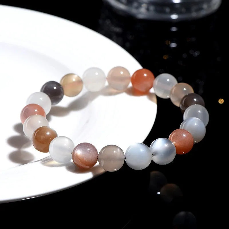 Natural moonstone bracelet with colourful light play in 8mm single circle design