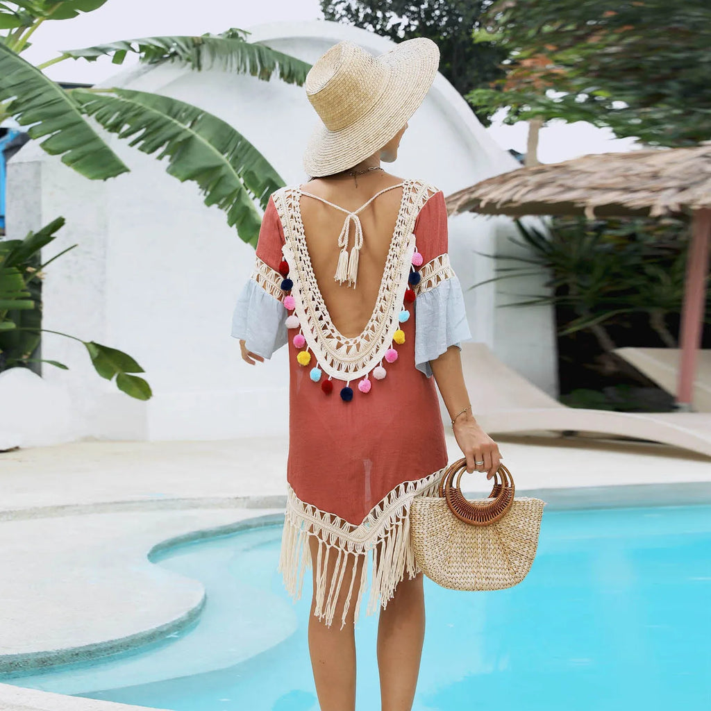 Orange floral pattern beach overskirt with hand crochet detail and bamboo cotton tassels.