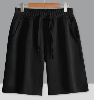Straight leg cotton sports shorts in light grey on a neutral background.