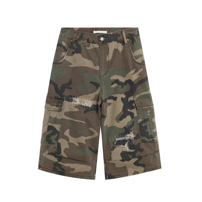 Men's loose camouflage jeans with retro patches and ripped detailing in cropped straight cut