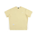 Loose-fit short-sleeved T-shirt with embroidered retro alphabet design on waffle-textured fabric.