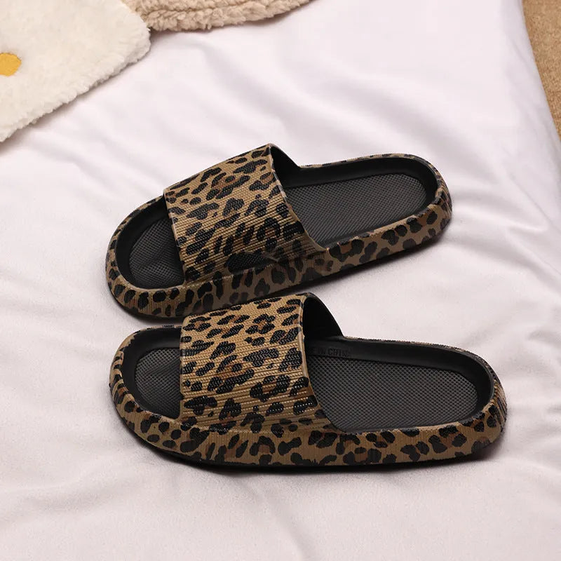 Women's leopard print slipper with thick EVA sole shown in multiple colour and print options.