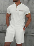 Men's gray short sleeve zip-up polo collar top with matching shorts, a cotton blend summer suit set.