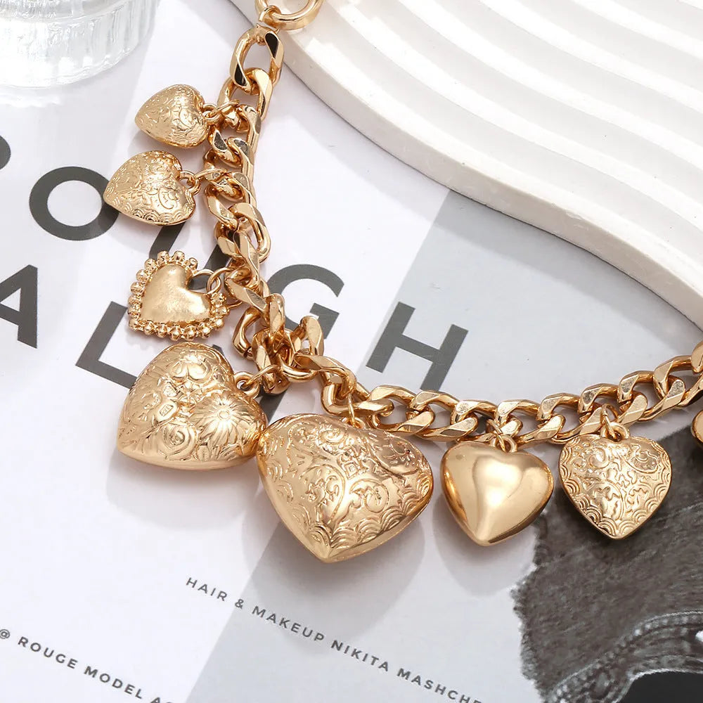 Carved heart pendant necklace with adjustable chain in gold or white K finish