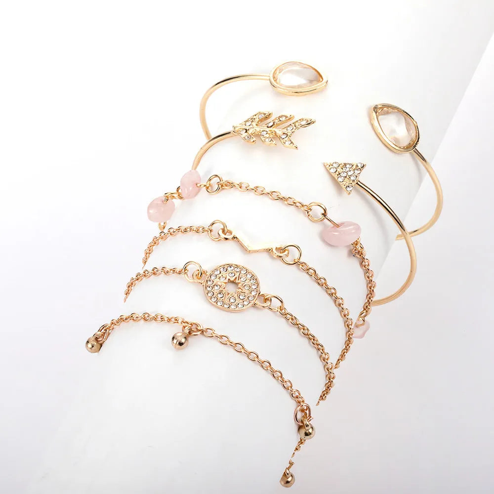 Six golden bracelets with spot drill, arrow, water drop and V-shaped pendants on zinc alloy chains