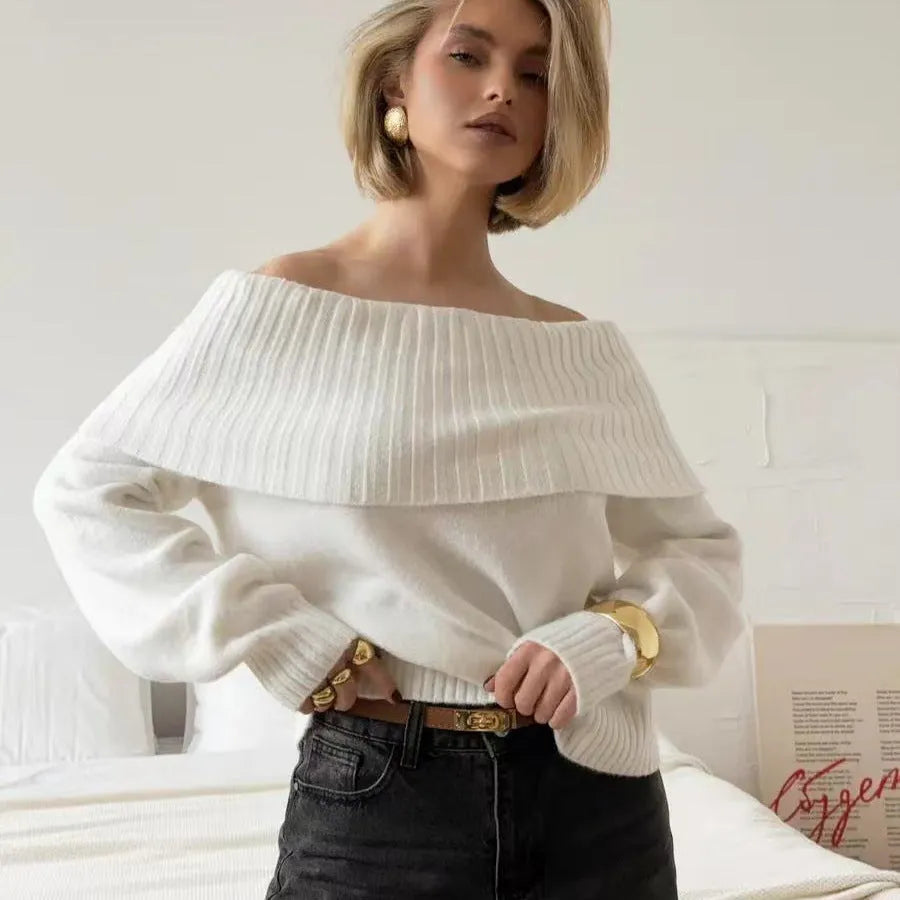 Off-the-shoulder grey acrylic sweater with 3D pattern effect and strapless design