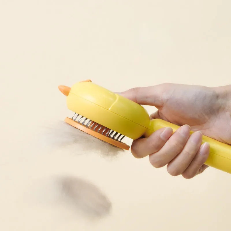Self-cleaning pet grooming brush with purple handle and stainless steel bristles
