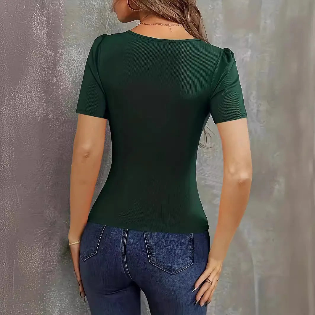 Women's slim fit knitted short sleeve pullover in polyester with low neckline