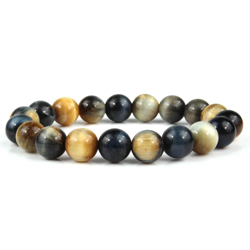 Natural tiger eye crystal beaded bracelet for men and women on a white background.